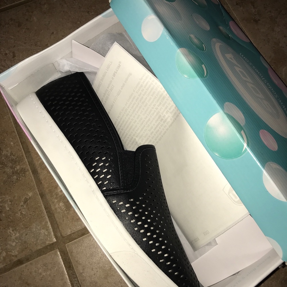 Black slip on sneakers
